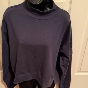 Women's All in Motion top Periwinkle color. 1. 2 avail, one NWOT and one NWT